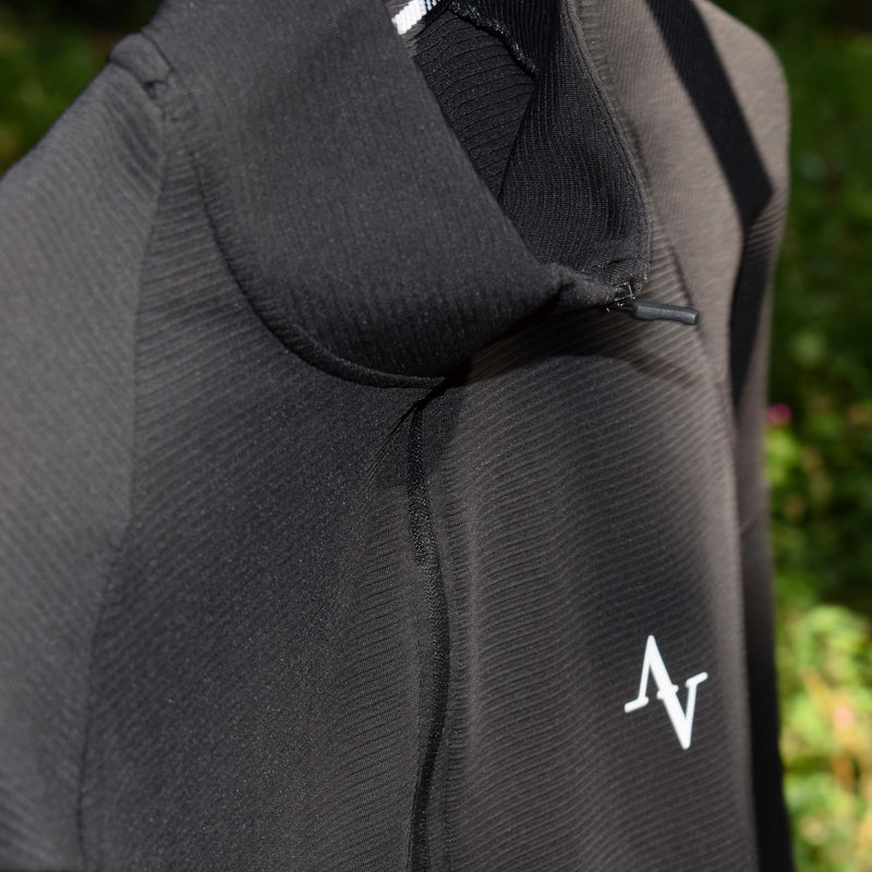 Men's Half Zip Jacket in black with sleek performance fabric and subtle logo detail. Ideal for gym sessions or weekend wear with modern versatility.